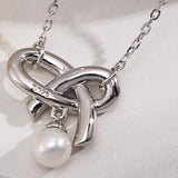 Cynthia - Sterling Silver and Freshwater Pearl Heart Bow Necklace - Pearlorious Jewellery